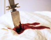 Nožem pokušala usmrtiti supruga